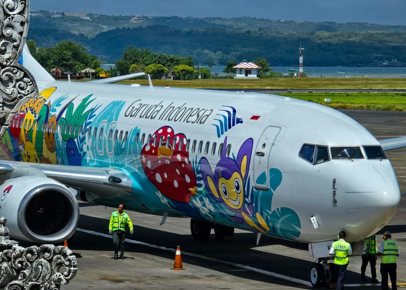 Colourful Garuda Indonesia plane on the tarmac at Bali airport