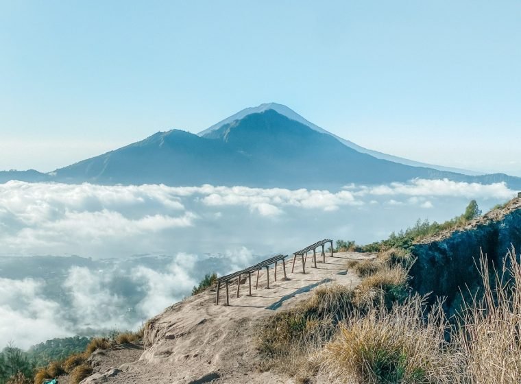 Hiker view of Mount Agung over a sea of clouds from Mount Batur