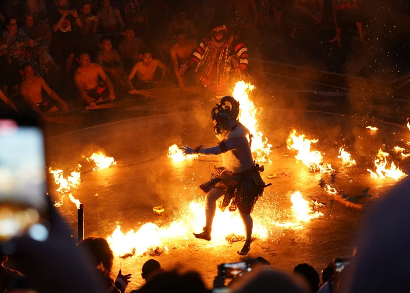 Balinese dancer performing the Kecak fire dance at night