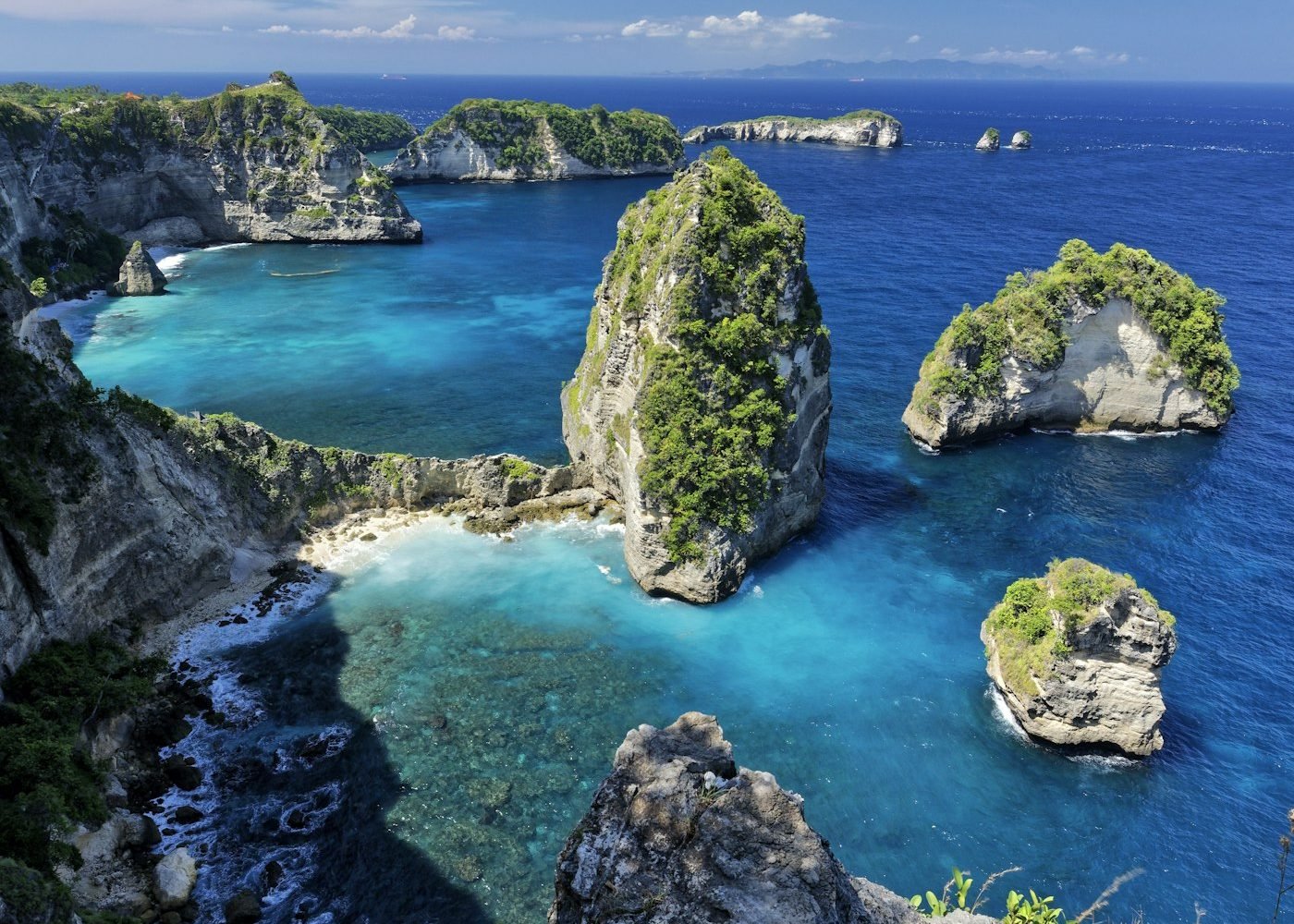 Turquoise natural pool surrounded by rocks on Nusa Penida