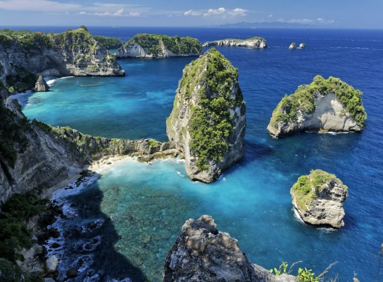 Turquoise natural pool surrounded by rocks on Nusa Penida