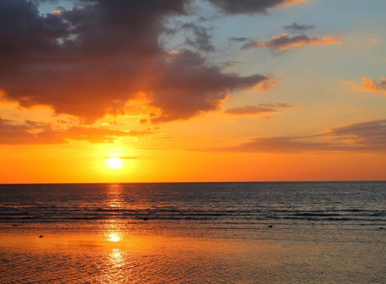 Orange sunset over the Indian Ocean in Bali